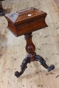 Victorian rosewood sarcophagus shaped sewing table on fluted pedestal tripod base, 38cm by 80cm.