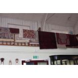 Collection of nine various rugs and prayer mats.