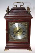 Bracket clock with brass and silvered dial and pineapple finials, 44cm.