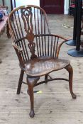 Antique Windsor elm and yew pierced splat back elbow chair.