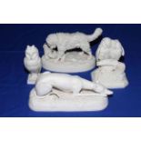 Four Victorian Parian animal figures; recumbent greyhound, length 28cm, Copeland owl on square base,