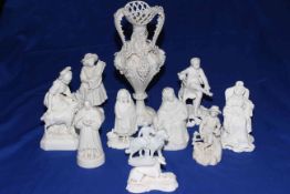 Collection of ten Victorian Parian figures, mostly pastoral subjects and vine encrusted vase (11).