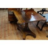 Victorian rosewood occasional table with shaped bow corners on pedestal quadriform base.