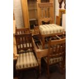 Set of five late Victorian oak dining chairs and stripped Victorian turned leg table base.