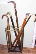 Brass six compartment stick stand and walking sticks including bone handled,