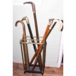 Brass six compartment stick stand and walking sticks including bone handled,