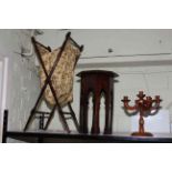 Folding mahogany x-framed sewing stand, octagonal plant stand and candle stand.