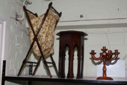 Folding mahogany x-framed sewing stand, octagonal plant stand and candle stand.