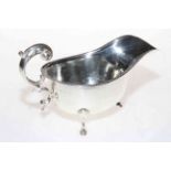 Silver sauce boat with gadroon border and scroll handle, Birmingham 1933.