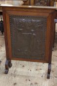 Oak Arts & Crafts copper panelled fire screen, 95cm by 67cm.