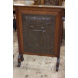 Oak Arts & Crafts copper panelled fire screen, 95cm by 67cm.