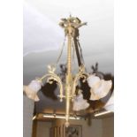 Brass three branch ornate chandelier, gilt metal Napoleon mantel clock,