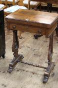 Victorian rosewood fold top games/sewing table raised on lyre supports, 75cm by 54cm (closed).