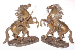 Pair of bronzed models of Marley horses.