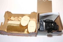 Box of ivory brushes, letter knives, napkin rings and bodkin holder, and Fuji camera.