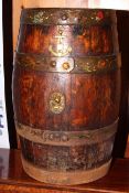 Coopered oak barrel with floral painted brass bands.