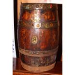 Coopered oak barrel with floral painted brass bands.