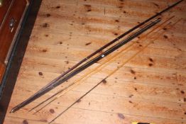 Two tribal hardwood bows and fishing spears (5).