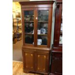 Edwardian inlaid mahogany standing corner cabinet having two glazed panel doors above two inlaid