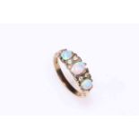 Opal and diamond ring set in 9 carat gold.