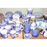 Collection of Ringtons including biscuit jars, teapots, year plates.