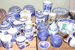 Collection of Ringtons including biscuit jars, teapots, year plates.