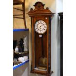 Victorian walnut and ebonised Vienna style wall clock.