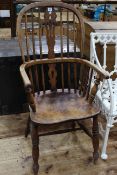 Windsor pierced splat back elbow chair.