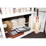 Gilt sunburst clock, collectors plates, framed cigarette cards, signed cricket bat (Pakistan 1992),