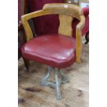 Vintage cast base swivel chair.