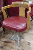 Vintage cast base swivel chair.