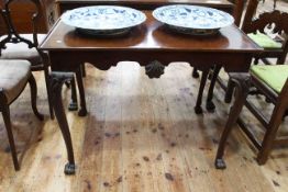 Late 19th/early 20th Century mahogany silver table on paw feet, 72cm by 92cm.