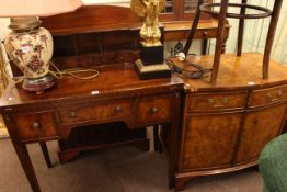 Mahogany fold top ladies writing desk and burr crossbanded two door bow front cabinet.