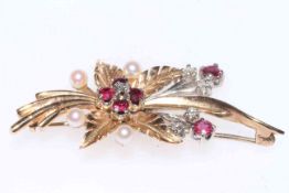 Gold bouquet brooch set with rubies, diamonds and pearls, hallmarked for 9 carat gold.