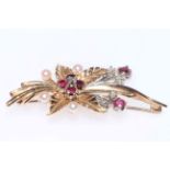 Gold bouquet brooch set with rubies, diamonds and pearls, hallmarked for 9 carat gold.