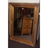 Rectangular gilt framed wall mirror, 116cm by 85cm overall.