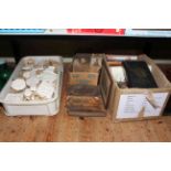 Collection of plaster relief moulds, antique bibles and other books.