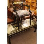 Oriental black lacquered and figure decorated rectangular coffee table, 44cm by 118cm,