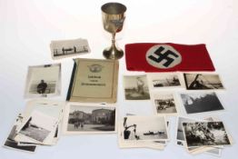German military items being armband, goblet, ID book and photographs.