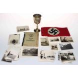 German military items being armband, goblet, ID book and photographs.