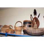 Wood and animal hide tribal shield, tribal drum and collection of wicker baskets.