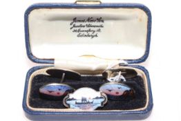 Pair silver and enamel cufflinks decorated with sunset coastal scenes, with similar brooch (2).