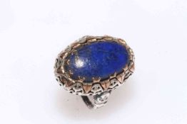Lapis ring mounted in silver and gold.