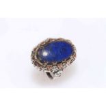 Lapis ring mounted in silver and gold.