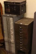 Two index cabinets and two deed boxes.