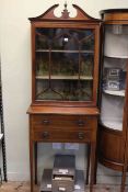 Edwardian mahogany and satinwood banded cabinet having glazed panel door top above two drawers on
