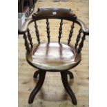 Early 20th Century Captains style swivel desk chair.