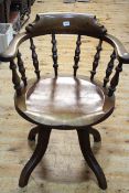 Early 20th Century Captains style swivel desk chair.