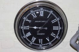 Kitchen wall clock marked Jaguar Cars Ltd.