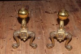 Pair of brass ball and claw fire dogs, 36cm.